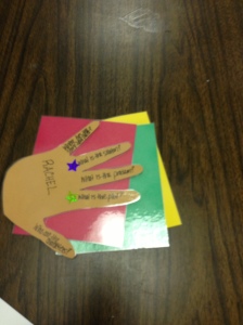 Cutout of hand used as writing prompt. Colored cards to place on desk to indicate student mood.